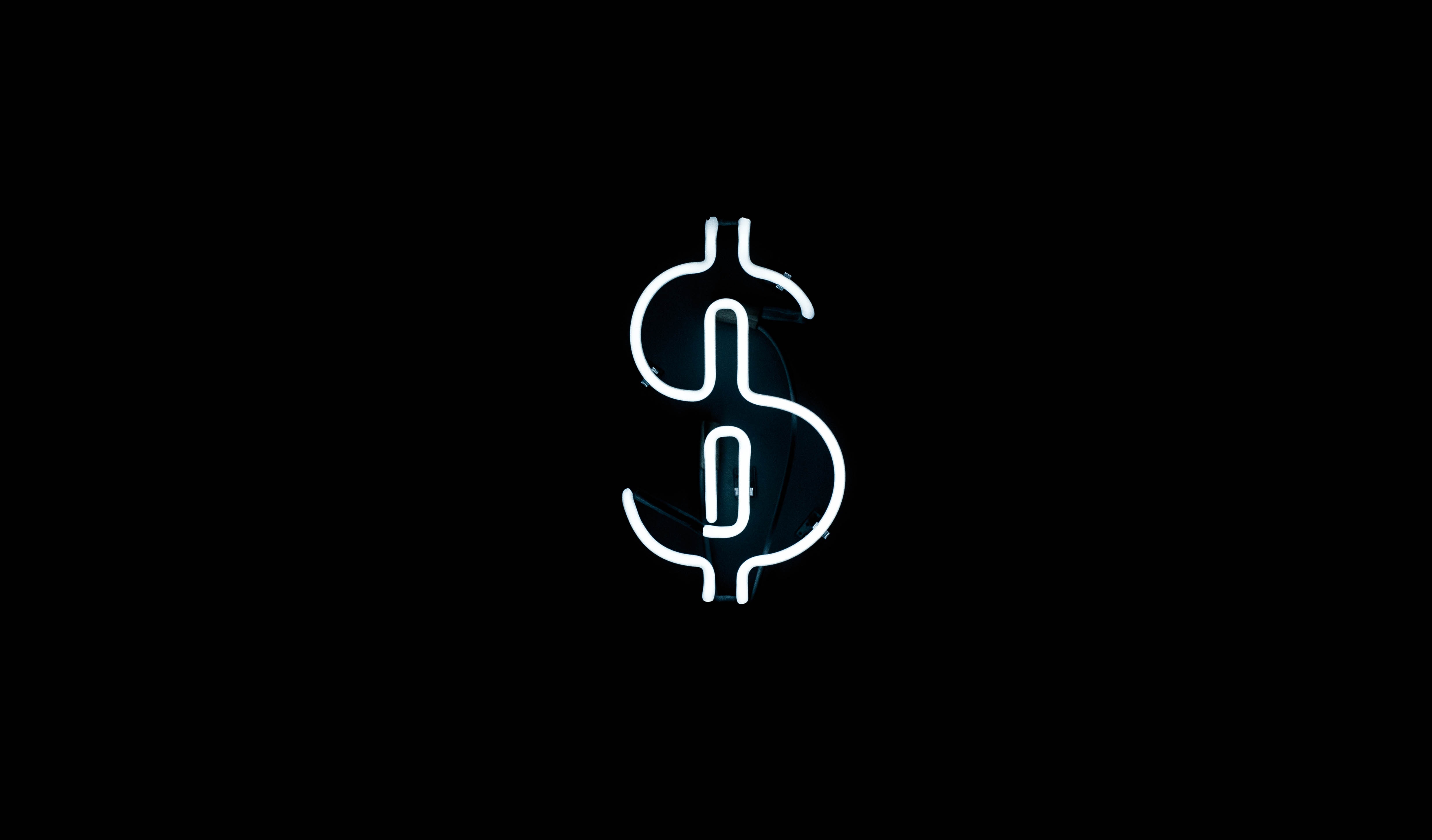 White dollar sign on a black background