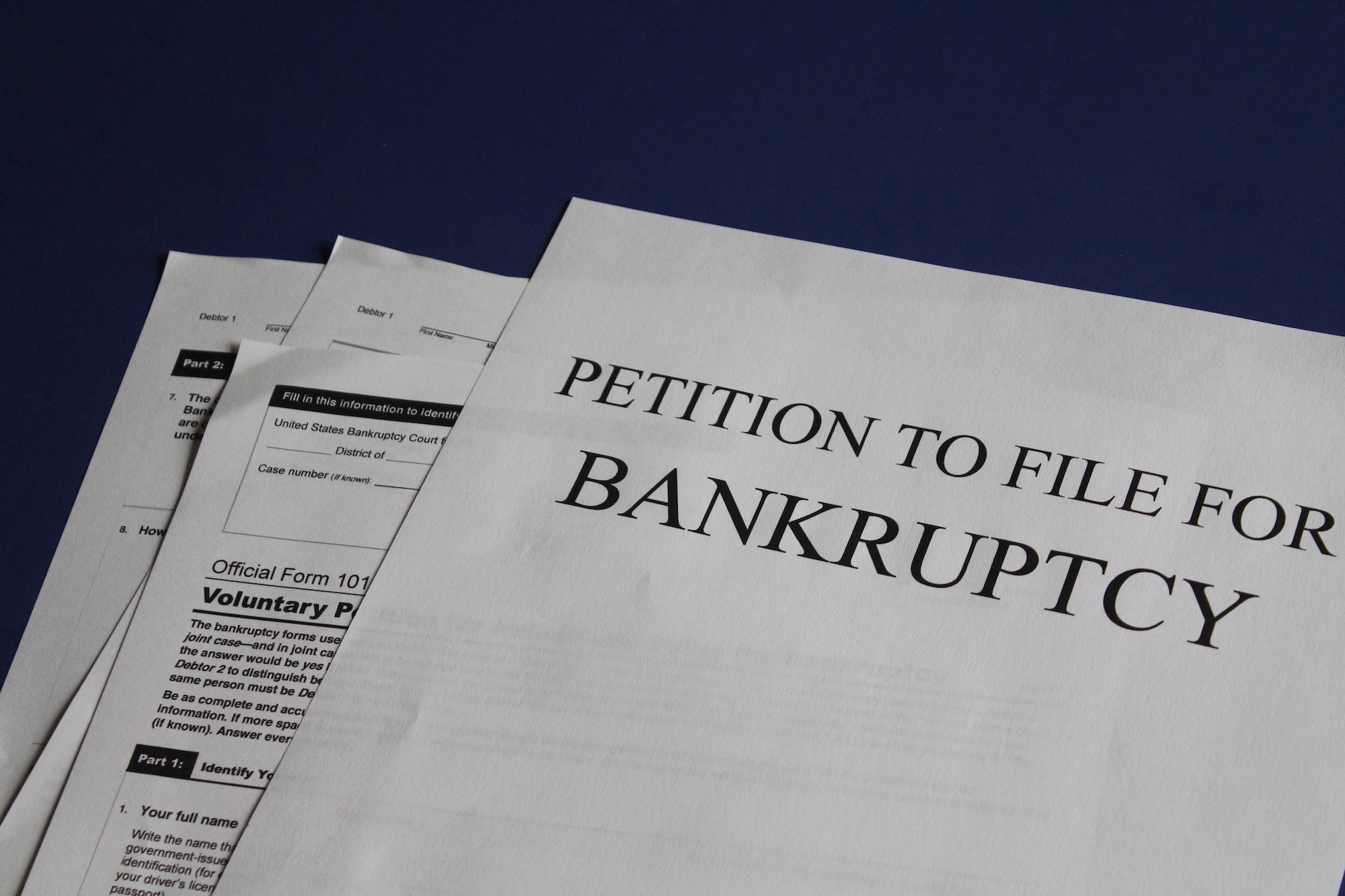 Staged pile of bankruptcy petition papers